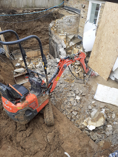 After much bashing and crashing the wall is removed