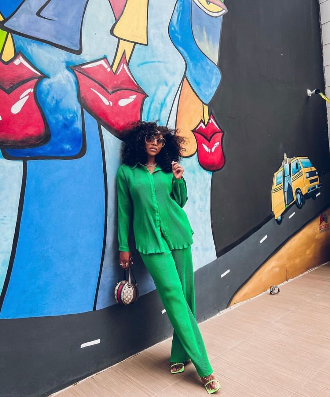 lady rocking two-piece green outfit for detty December in Lagos
