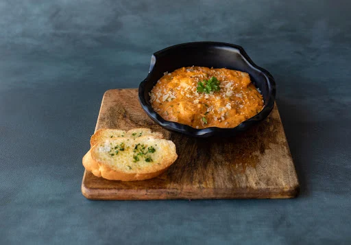 Spinach And Cottage Cheese Ravioli In Pink Sauce