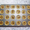 Thumbnail For Egg, Butter, Brown Sugar, Salt, And Vanilla Filling Poured Into Muffin Tins.