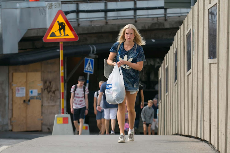  A local woman in Gamla stan, the name of Stockholm’s old town. 