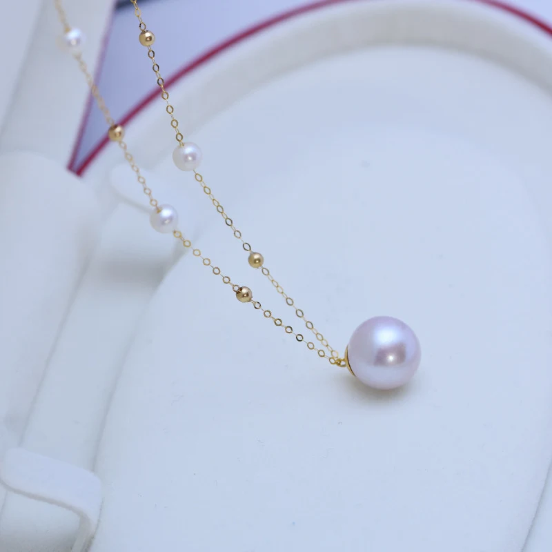 Zoetwater parel hanger ketting 11-12mm met G18K gouden ster. Verfraai uw look met deze elegante en tijdloze ketting, perfect voor elke gelegenheid.