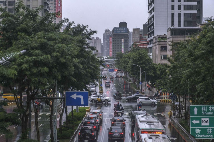 Vehicles travel along a road in Taipei, Taiwan, on Tuesday, August 2, 2022. The White House sought to dial back rising tensions with China over House Speaker Nancy Pelosi’s expected visit to Taiwan, insisting the trip doesn’t signal a change in US posture toward the island and urging Beijing to refrain from an aggressive response.