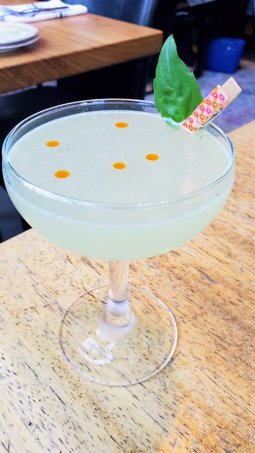 Portland Dining Month 2020 at Hairy Lobster: Jungle Love with Snow Leopard Vodka, Novo Fogo Cachaca, Thai basil, lime, Brazilian Bitters