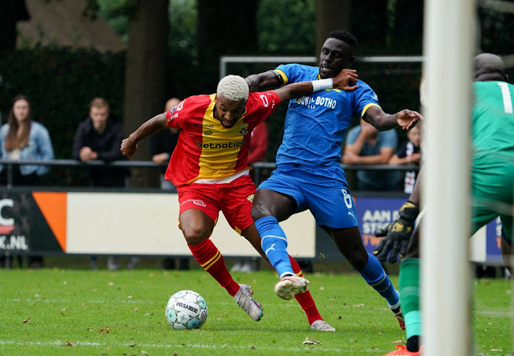 Mamelodi Sundowns' Brian Onyango challenges Sylla Sow of Go Ahead Eagles in their preseason match at Sportpark De Laene in Twello, Netherlands.