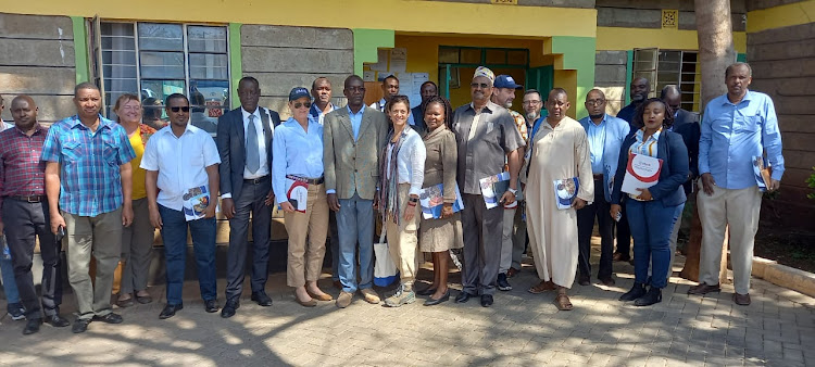 County Commissioner Geoffrey Omoding, CEC Agriculture, Livestock development Dr Lawrence Mwongera and his health Counterpart Wario Galma with USAID delegates in Isiolo on September 16, 2022