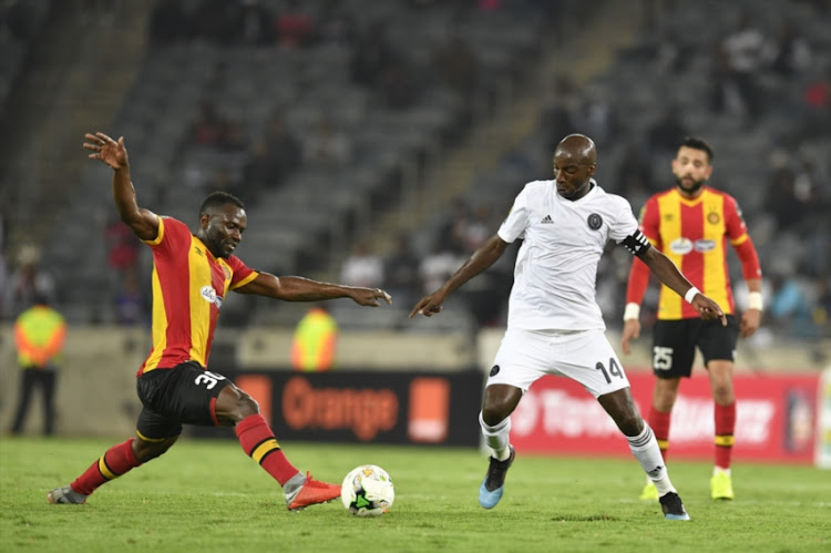 Musa Nyatama of Orlando Pirates and Franck Nom of Esperance during the CAF Champions League match between Orlando Pirates and Esperance at Orlando Stadium on February 02, 2019 in Johannesburg, South Africa.