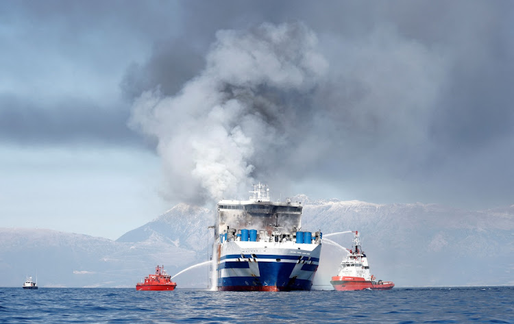 Smoke rises from the Italian-flagged Euroferry Olympia, which sailed from Greece to Italy early on Friday and caught fire, off the coast of Corfu, Greece, February 19, 2022.