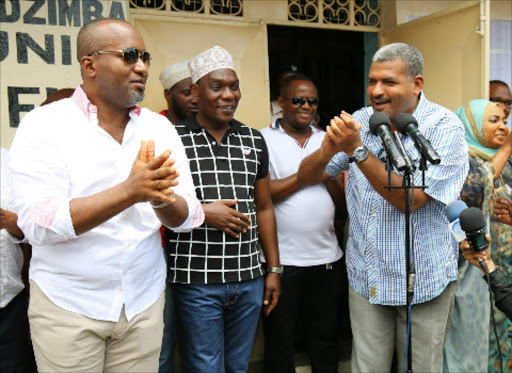 From (left) Mombasa governor Hassan Joho, Kisauni MP Rashid Bedzimba, Mvita Mp Abdulswamad Nassir and Mombasa women rep Mishi Mboko during the handing over of school bursary in Kisauni on Saturday.Photo/GPS