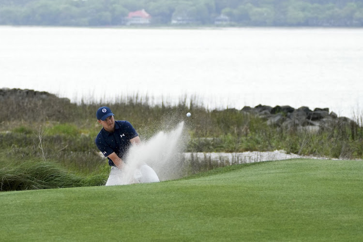 Jordan Spieth hits from the bunker on the first playoff hole after the final round of the RBC Heritage tournament at Hilton Head, South Carolina, on Sunday. Picture: DAVID YEAZELL/USATODAY SPORTS