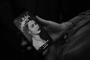 A person holds their phone with a screensaver of Queen Elizabeth II who died this afternoon on September 8, 2022 in London, England. Elizabeth Alexandra Mary Windsor was born in Bruton Street, Mayfair, London on 21 April 1926. She married Prince Philip in 1947 and acceded the throne of the United Kingdom and Commonwealth on 6 February 1952 after the death of her Father, King George VI.Queen Elizabeth II died at Balmoral Castle in Scotland on September 8, 2022, and is survived by her four children, Charles, Prince of Wales, Anne, Princess Royal, Andrew, Duke Of York and Edward, Duke of Wessex. 