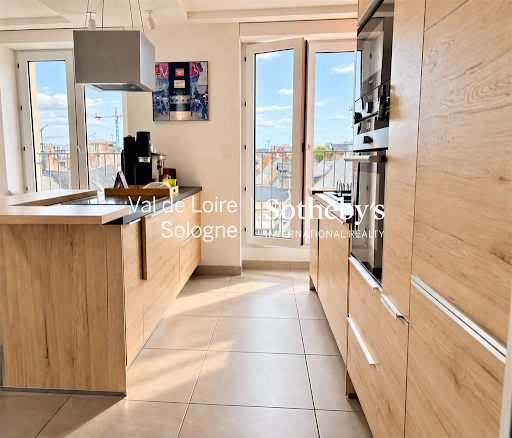 Modern kitchen with island, open view - Buy this luxury property in Orleans, 5 rooms, 3 bedrooms
