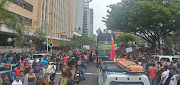 South African Rugby team parades through the streets of Durban CBD on an open top bus on Friday.