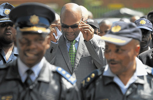 Police Minister Nathi Mthethwa visits Daveyton, on the East Rand, to try to calm the community after the death of Mozambican taxi driver Mido Macie, who was dragged behind a police van