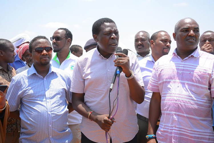 Devolution CS Eugene Wamalwa (holding mic) in Garissa