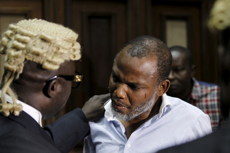 Indigenous People of Biafra (IPOB) leader Nnamdi Kanu is seen with his counsel at the Federal high court Abuja, Nigeria on January 20, 2016.