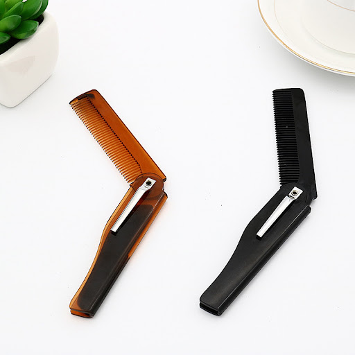 Title 2, Travel-sized plastic comb, compact and durable,...