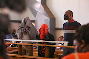 Simon Scorpion Ndyalvane, left, Caylene Whiteboy and Vorster Netshiongolo during an earlier court appearance. File photo.