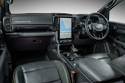 The interior is typically Wildtrak in layout and materials, including contrast stitching and a 10-inch digital display.