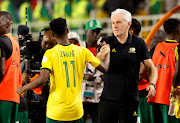 South Africa's Themba Zwane shakes hands with coach Hugo Broos after Afcon match between Bafana Bafana and Tnunisia on Wednesday