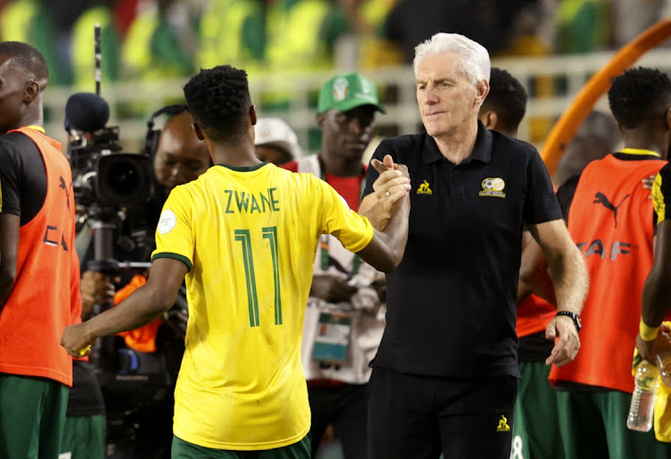 South Africa's Themba Zwane shakes hands with coach Hugo Broos after Afcon match between Bafana Bafana and Tnunisia on Wednesday