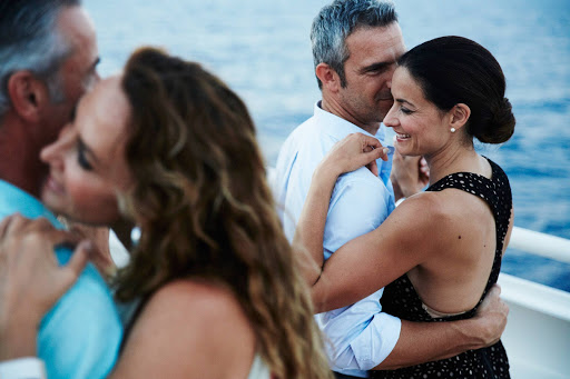 Seabourn-romance-1 - Couples dance to live entertainment at twilight during a Seabourn cruise.