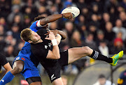 Benjamin Fall of France competes for the ball with Jordie Barrett of New Zealand at Westpac Stadium, Wellington, New Zealand on June 16, 2018.