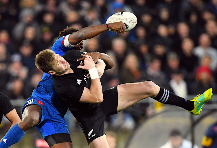 Benjamin Fall of France competes for the ball with Jordie Barrett of New Zealand at Westpac Stadium, Wellington, New Zealand on June 16, 2018.