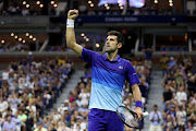 Novak Djokovic of Serbia celebrates defeating Jenson Brooksby of the USA during their men’s singles round of 16 match of the 2021 US Open at USTA Billie Jean King National Tennis Center on September 06, 2021 in the Flushing neighborhood of the Queens borough of New York City.