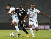 Butholezwe Ncube of AmaZulu challenges Gabadinho Mhango of Orlando Pirates during the DStv Premiership 2020/21 match between Orlando Pirates and AmaZulu on the 27 May 2021 at Orlando Stadium