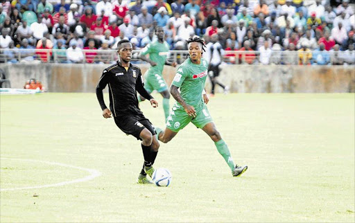 TRICK HURDLE AHEAD: Mthatha Bucks midfielder Sihle Maso on the attack during the match against AmaZulu. Bucks hope to emerge victorious when they take on Santos tonight Picture: LULAMILE FENI