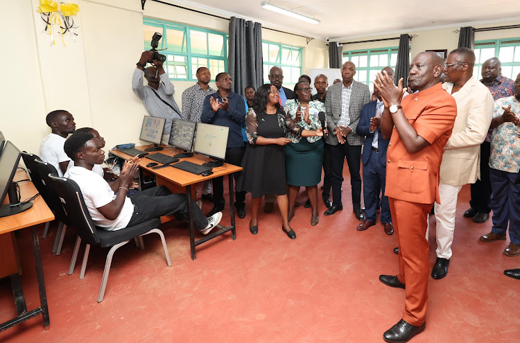 President William Ruto and ICT CS Eliud Owalo at URIRI Technical and Vocational College Konza Digital Skill Laboratory on October 8, 2023.