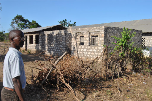 The chairman of Kwachocha South Development project who represent the families affected by the expansion of the Malindi airport shows some of the developments which have stalled due to delay in compensation. Photo Alphonce Gari