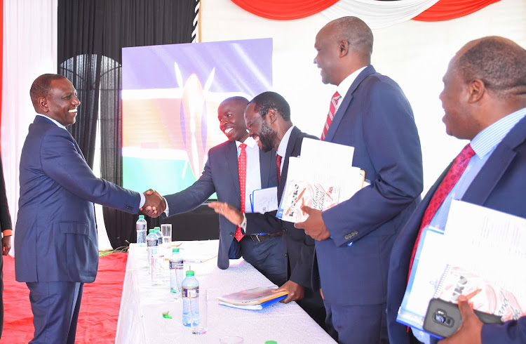 Deputy President William Ruto chats with Governors Stephen Sang (Nandi) Anyang Nyongo (Kisumu) and Stanley Kiptis (Baringo) during the Intergovernmental Budget and Economic Council meeting, Karen Office, Nairobi on November 11, 2019.