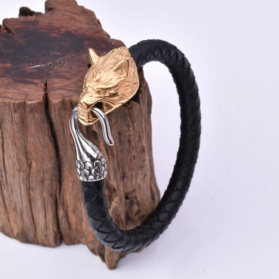 Bracelet Viking pour homme en cuir et tête de loup en acier inoxydable, un bijou robuste et stylé pour affirmer votre personnalité.