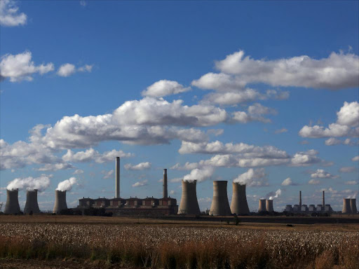 Smoke rises from the cooling towers of Matla Power Station, a coal-fired power plant operated by Eskom in Mpumalanga province, South Africa, May 20, 2018. /REUTERS