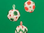 Popcorn Ball Ornaments was pinched from <a href="http://spoonful.com/recipes/popcorn-ball-ornaments" target="_blank">spoonful.com.</a>