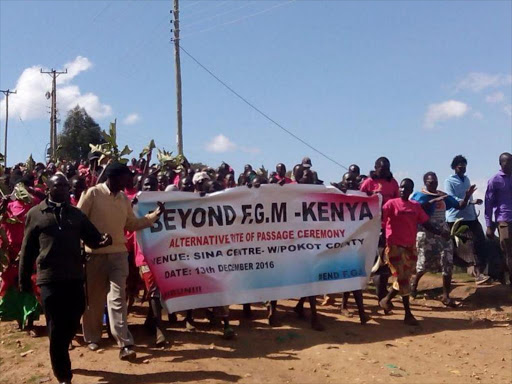 over 160 girls who had undergone alternative rite of passage sing anti FGM songs at Sina Market