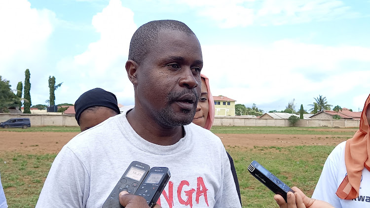 Huria project officer Mwinyihaji Chamosi speaks in an interview at Kombani football ground in Matuga on August 6, 2022.