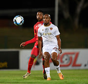 Siphosethu Ndlabi of Milford FC challenges Athenkosi Mcaba of Stellenbosch during their Nedbank Cup last-16 match at Princess Magogo Stadium.