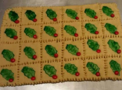 This shows the shortbread ready for the oven. When it's done, it will easily break apart where it has been pricked with a fork.