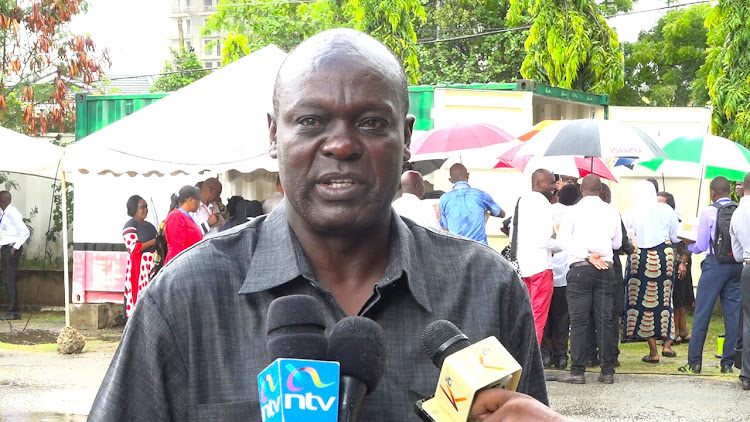 Coast Region Director of Education Luka Kangogo addressing the press on Monday morning