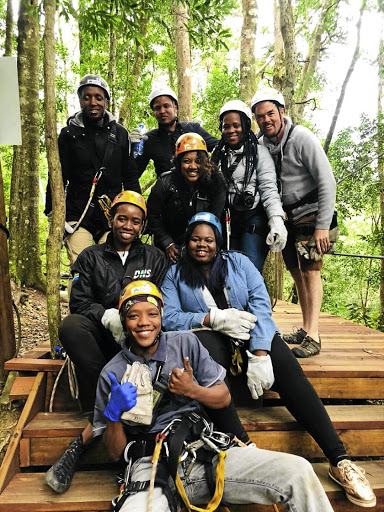 The writer, back right, and friends with Tsitsikamma Canopy Tour guide Heiney Jacobs, front.