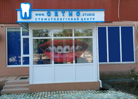 Ortho Studio - ортодонтический центр. Брекеты металлические, брекеты керамические.