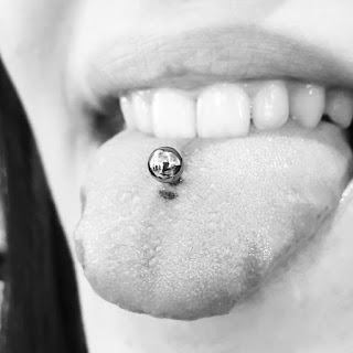 Amygdala Piercing Tattoo