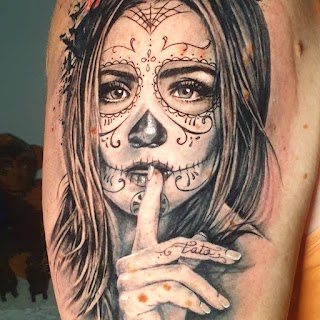 La Scimmia Tatuata