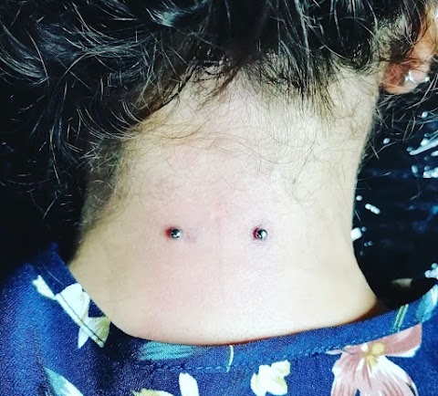 STUDIO WOLAND TATTOO PIERCING