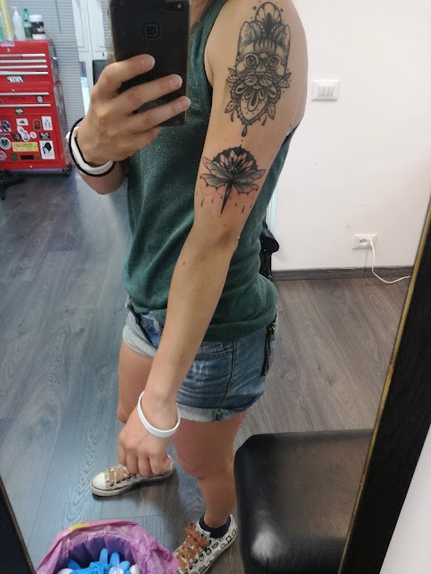 Ultimi Romantici Tattoo