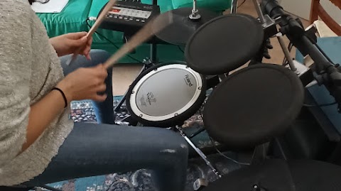 Scuola di musica drum & sing - batteria e canto