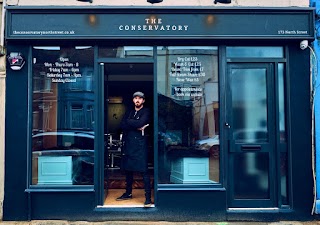 The Conservatory Unisex Barbers